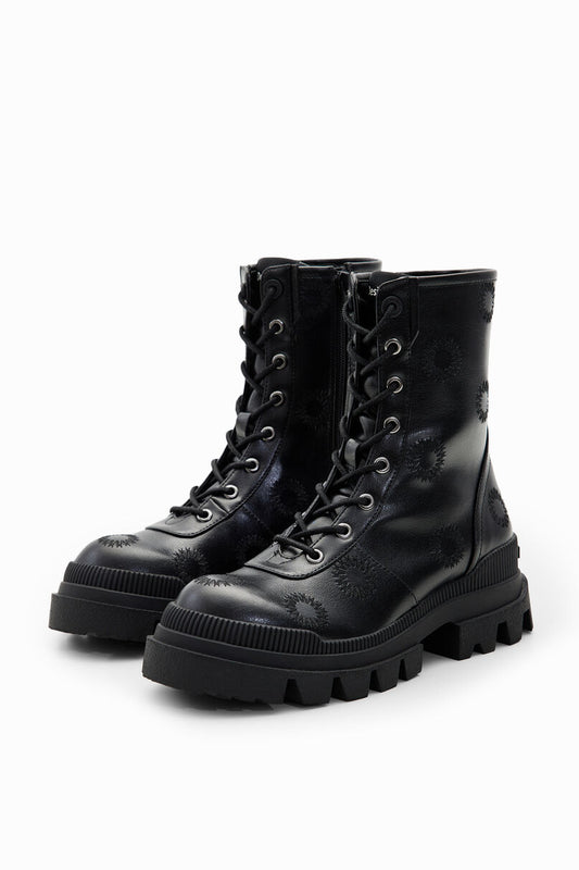 Embroidered track-sole boots