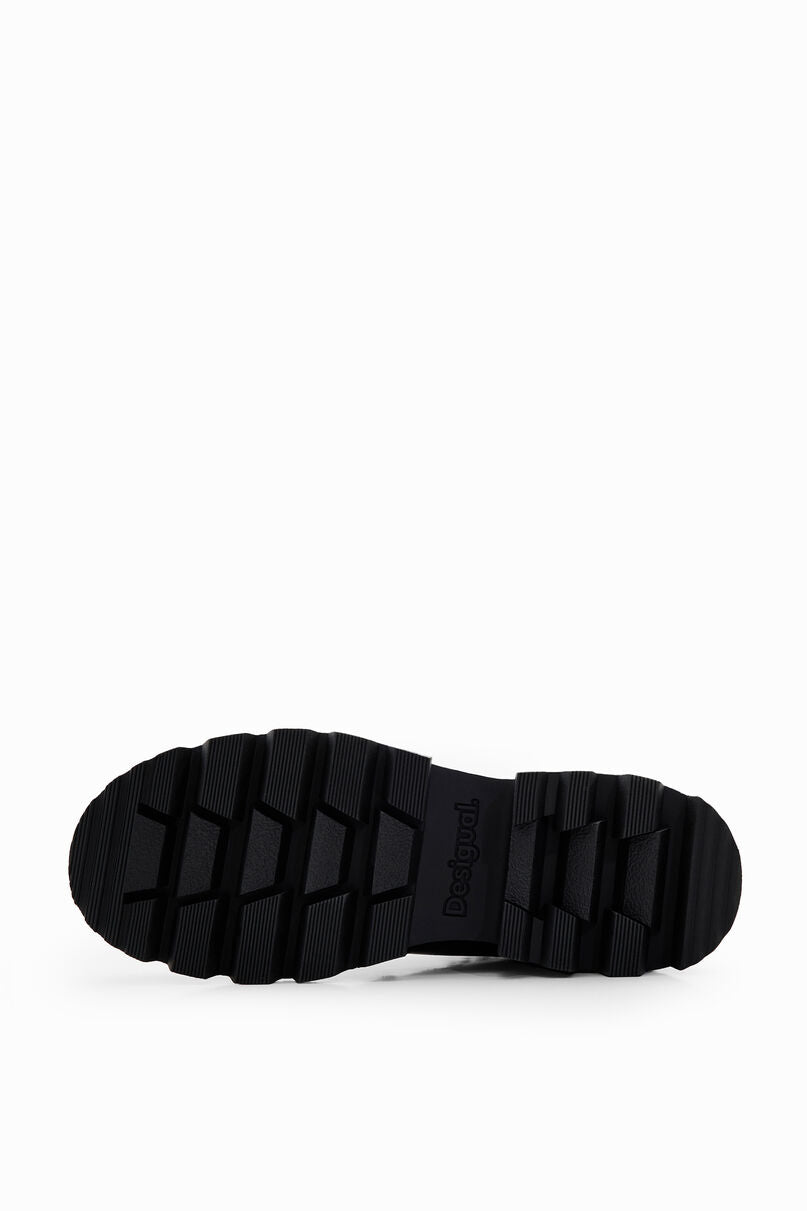 Embroidered track-sole boots